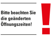 Schild mit Aufschrift "Bitte beachten Sie die geänderten Öffnungszeiten"