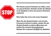 Schild mit Aufschrift "Bitte halten Sie sich an die neuen Vorgaben" und Stop-Schild