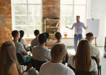 Plenum bei einem Vortrag